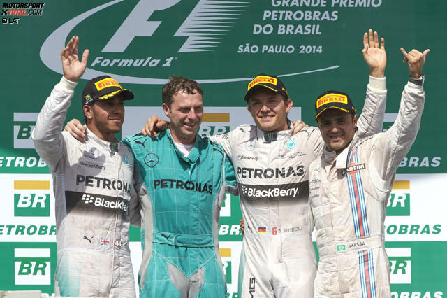 Die Formel-1-WM 2014 bleibt spannend! Nico Rosberg gewinnt den Grand Prix von Brasilien und macht damit sieben Punkte auf Lewis Hamilton gut. Wie es dazu kam, erzählen wir in 22 spektakulären Fotos nach.