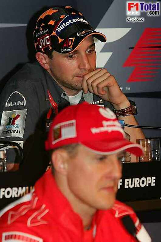 Christijan Albers (MF1 Racing), Michael Schumacher (Ferrari)