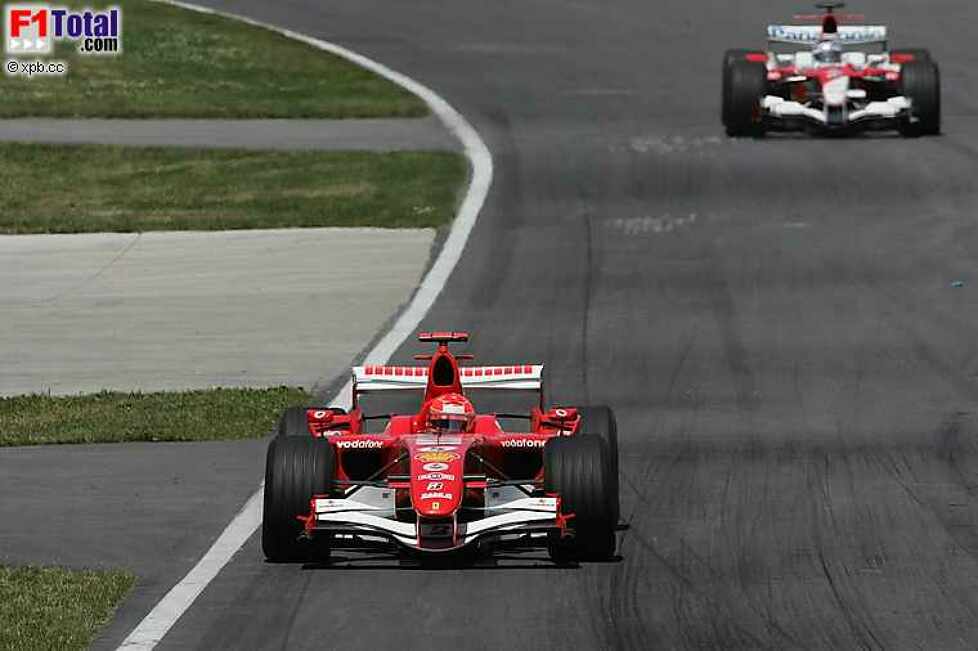 Jarno Trulli (Toyota), Michael Schumacher (Ferrari)