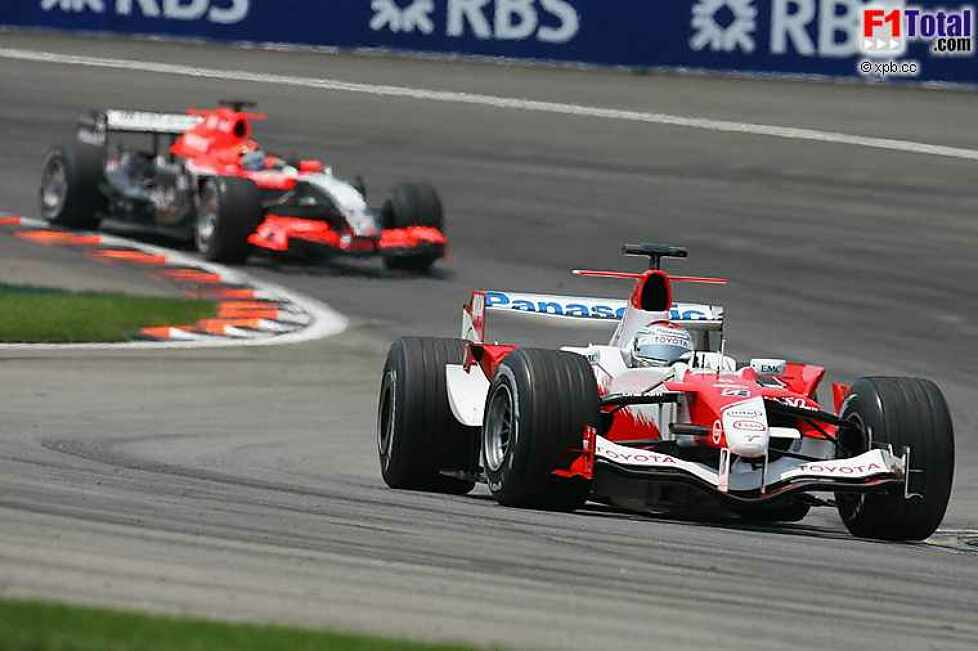 Christijan Albers (MF1 Racing), Jarno Trulli (Toyota)