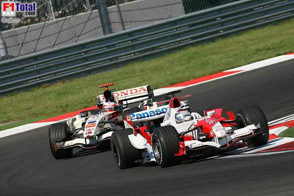 Jarno Trulli (Toyota), Rubens Barrichello (Honda Racing F1 Team)