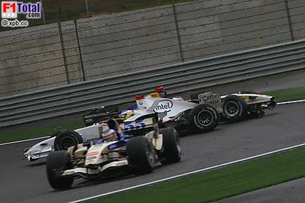 Nick Heidfeld (BMW Sauber F1 Team), Rubens Barrichello (Honda Racing F1 Team)