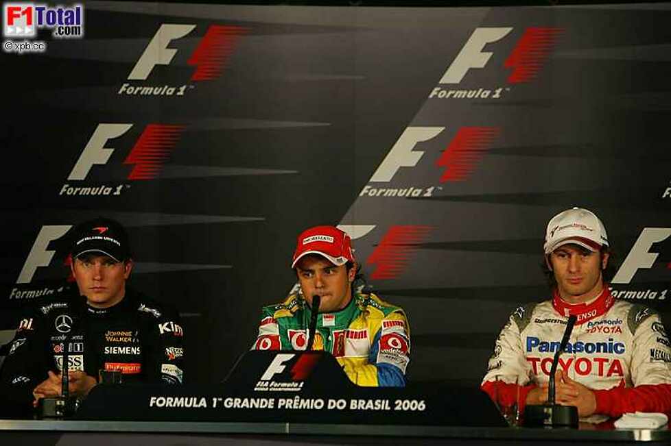 Felipe Massa (Ferrari), Jarno Trulli (Toyota), Kimi Räikkönen (McLaren-Mercedes)