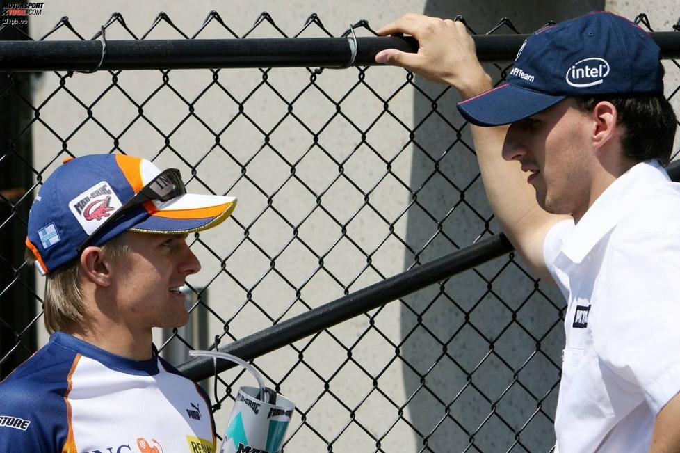 Heikki Kovalainen (Renault) und Robert Kubica (BMW Sauber F1 Team) 