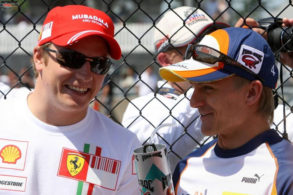 Kimi Räikkönen (Ferrari) und Heikki Kovalainen (Renault) 
