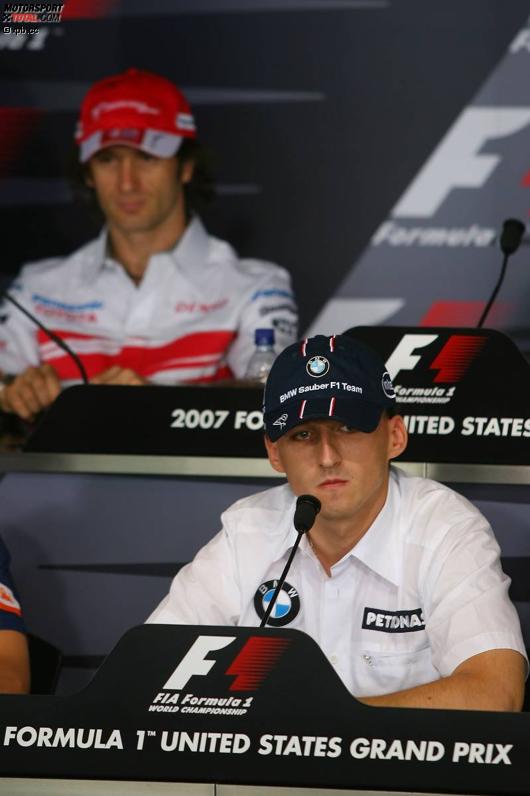 Jarno Trulli (Toyota) und Robert Kubica (BMW Sauber F1 Team) 