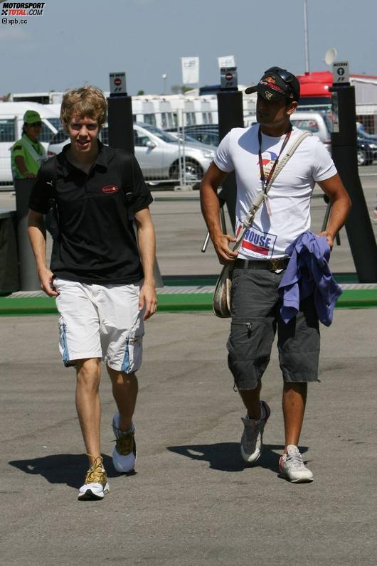 Sebastian Vettel und Vitantonio Liuzzi (Toro Rosso) 
