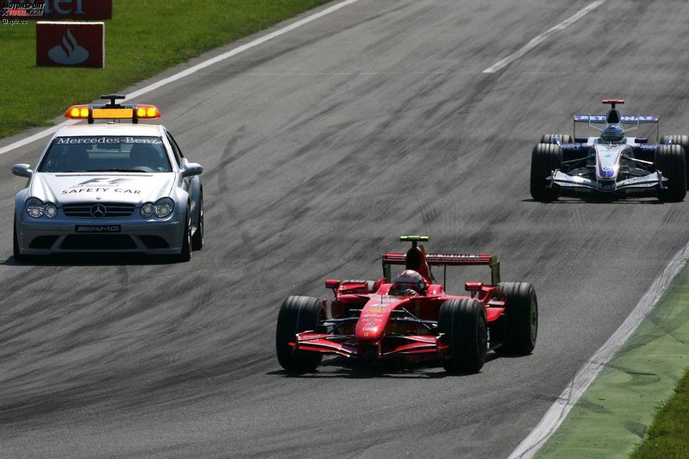 Kimi Räikkönen (Ferrari) und Nick Heidfeld (BMW Sauber F1 Team) 