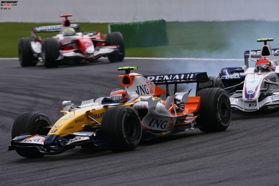 Heikki Kovalainen Robert Kubica (Renault) (BMW Sauber F1 Team) 