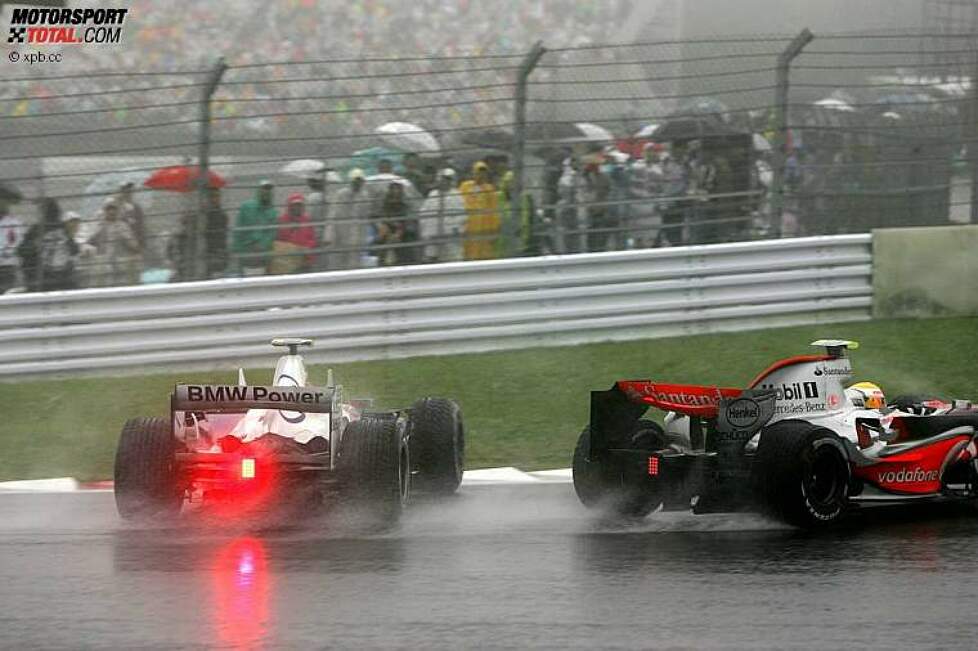 Robert Kubica (BMW Sauber F1 Team) und Lewis Hamilton (McLaren-Mercedes) 