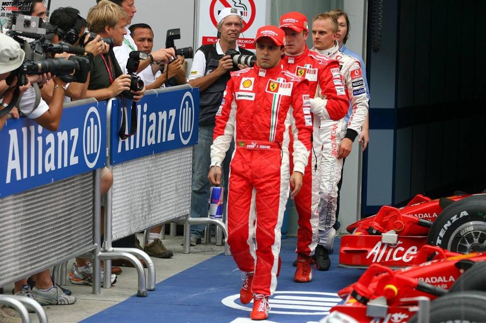 Felipe Massa, Kimi Räikkönen (Ferrari) und Heikki Kovalainen (McLaren-Mercedes) 