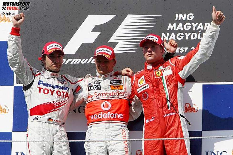 Timo Glock (Toyota), Heikki Kovalainen (McLaren-Mercedes) und Kimi Räikkönen (Ferrari) 