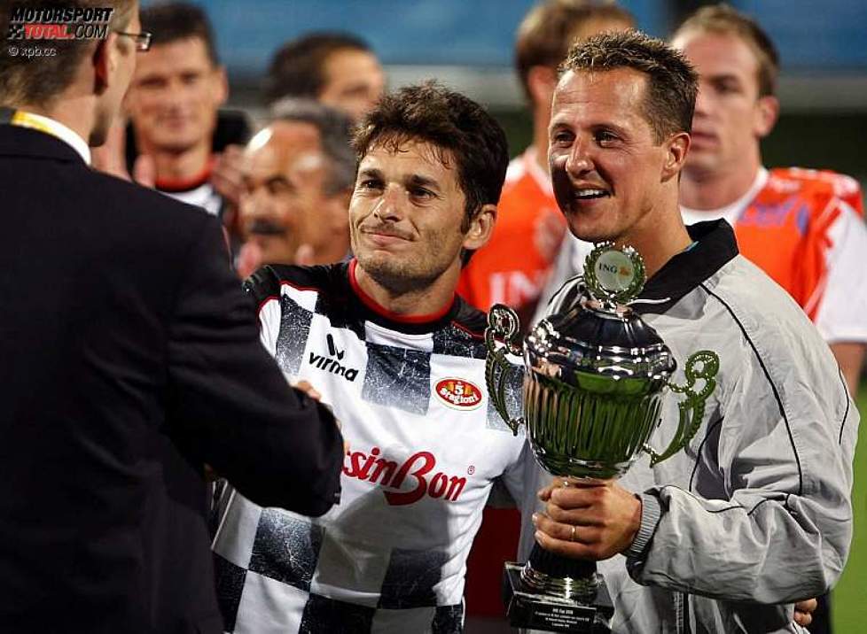Giancarlo Fisichella (Force India) und Michael Schumacher (Ferrari) 