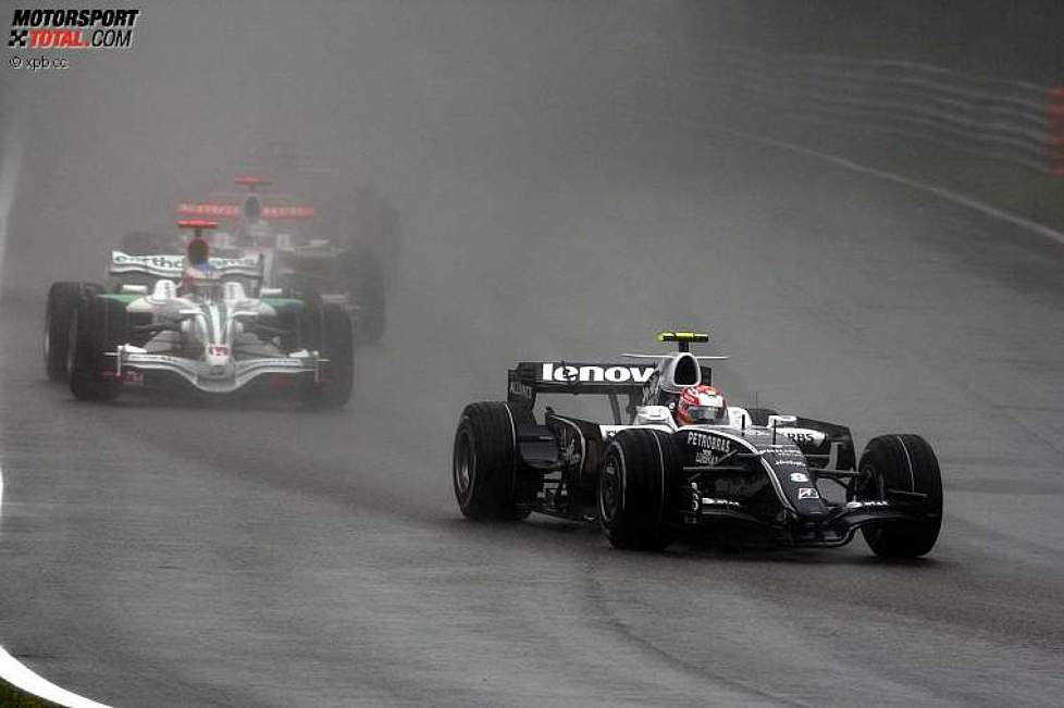 Kazuki Nakajima (Williams) vor Jenson Button (Honda F1 Team) 