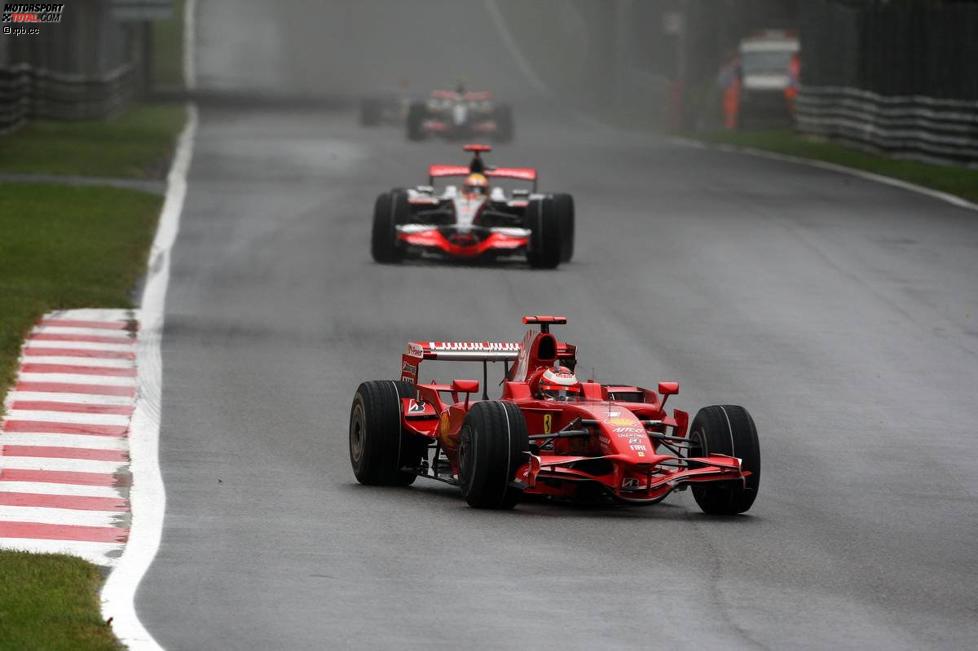Kimi Räikkönen Lewis Hamilton (Ferrari) (McLaren-Mercedes) 