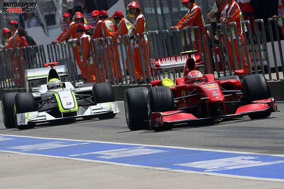 Kimi Räikkönen (Ferrari) und Jenson Button (Brawn) 