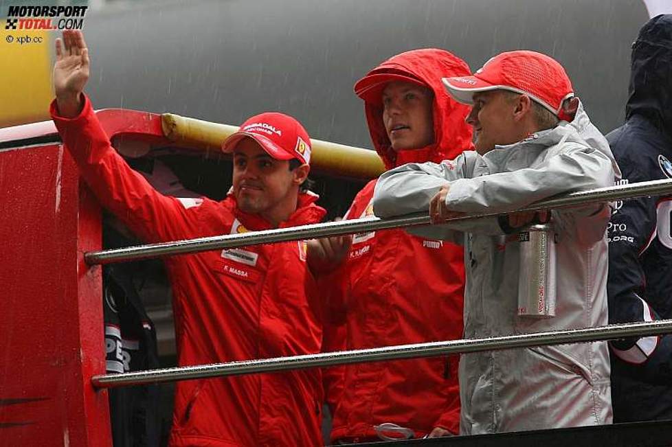 Felipe Massa, Kimi Räikkönen (Ferrari) und Heikki Kovalainen (McLaren-Mercedes) 
