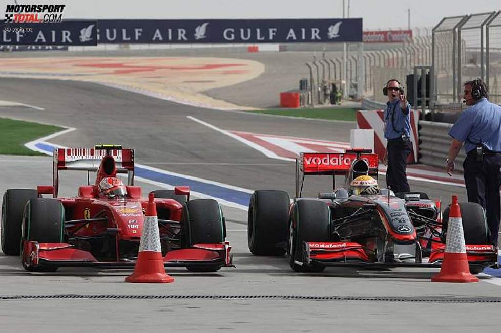 Kimi Räikkönen (Ferrari) und Lewis Hamilton (McLaren-Mercedes) 