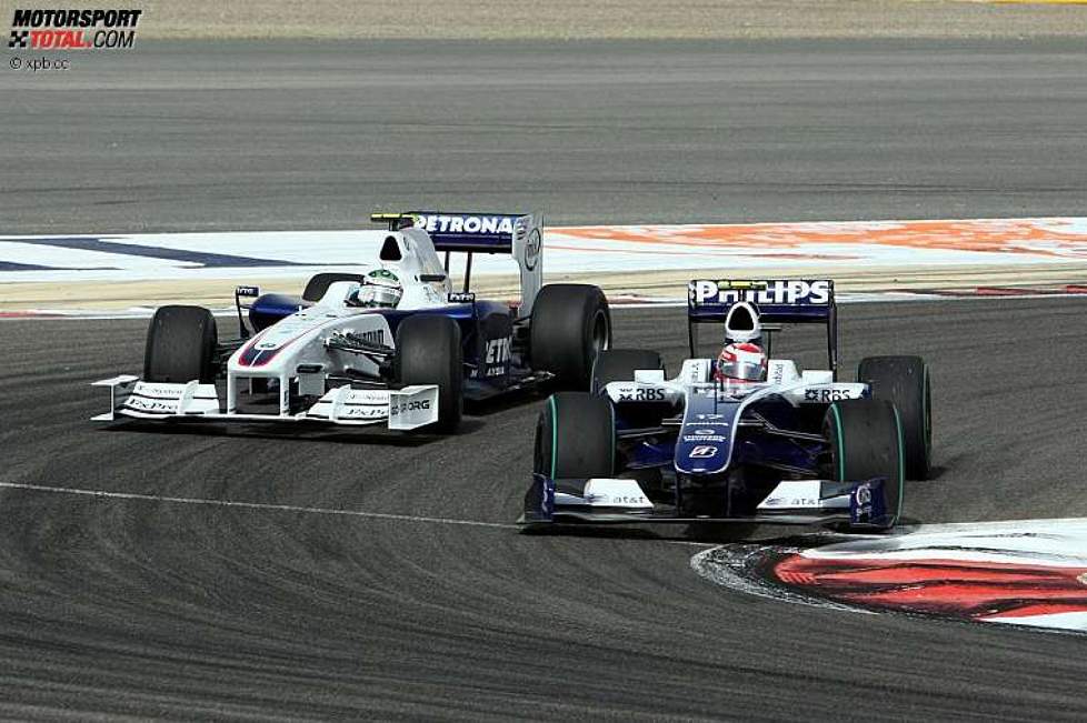 Kazuki Nakajima (Williams) und Nick Heidfeld (BMW Sauber F1 Team) 