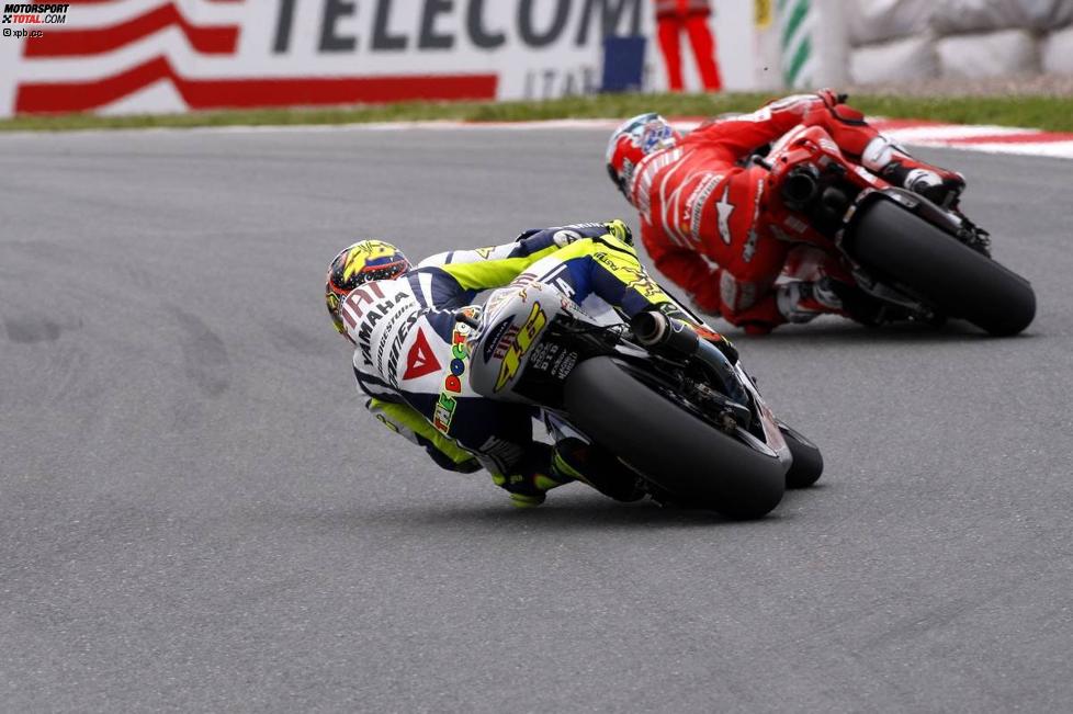 Valentino Rossi (Yamaha), Casey Stoner (Ducati) 