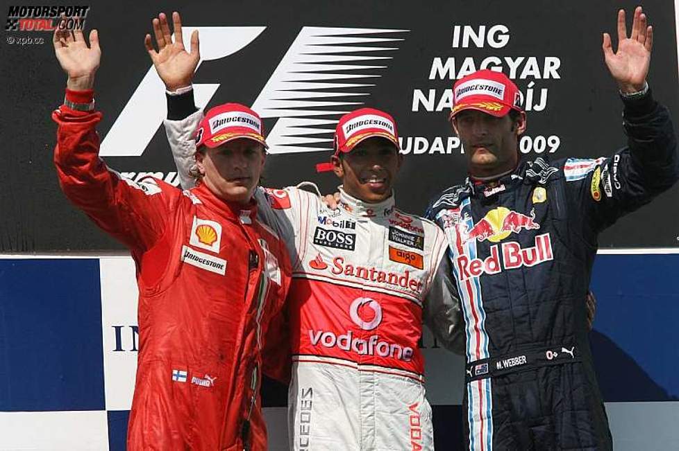 Kimi Räikkönen (Ferrari), Lewis Hamilton (McLaren-Mercedes) und Mark Webber (Red Bull) 