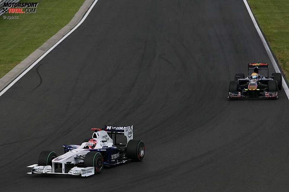 Robert Kubica (BMW Sauber F1 Team) und Sébastien Buemi (Toro Rosso) 