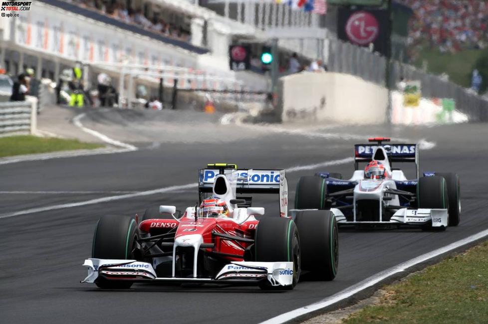 Timo Glock (Toyota) und Robert Kubica (BMW Sauber F1 Team) 