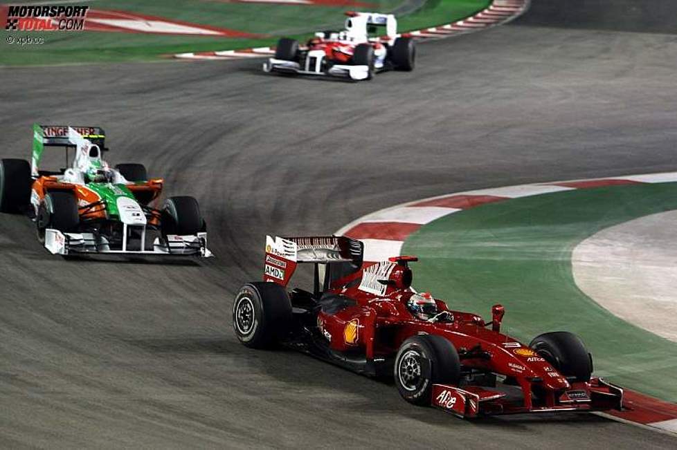 Giancarlo Fisichella (Ferrari) vor Vitantonio Liuzzi (Force India) 