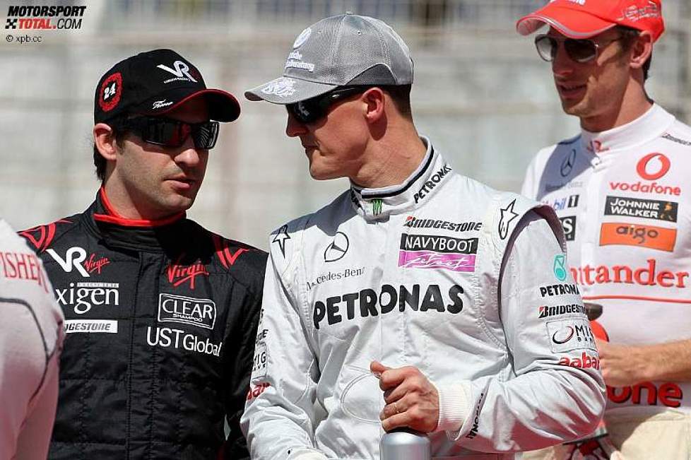 Timo Glock (Virgin) und Michael Schumacher (Mercedes) 