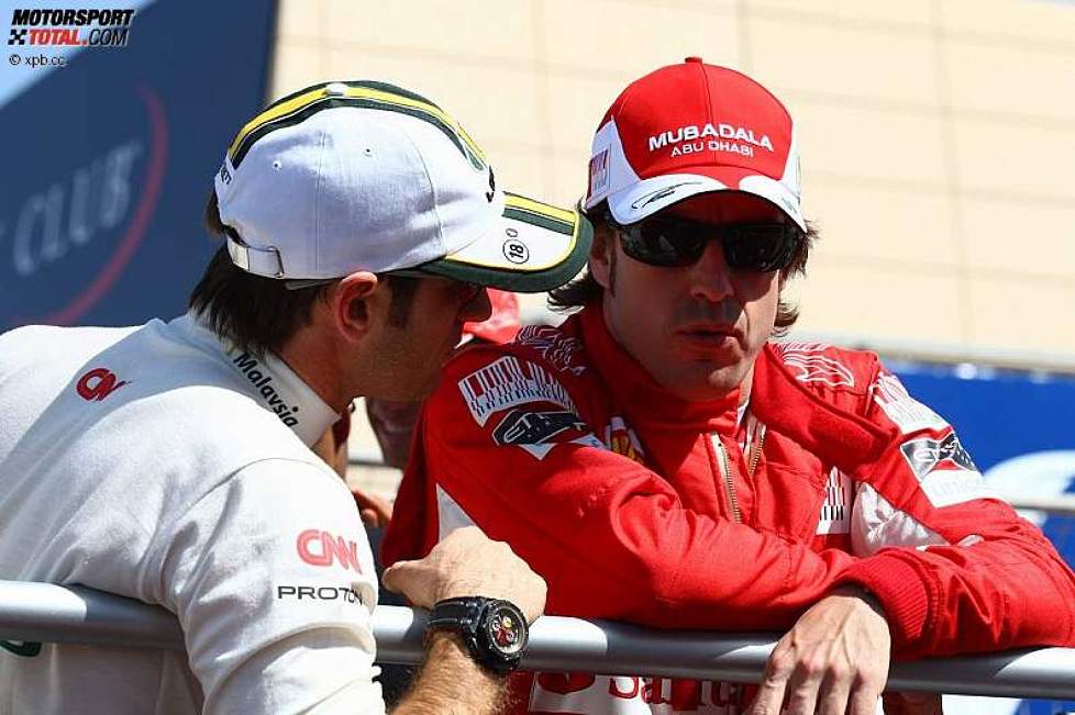 Jarno Trulli (Lotus) und Fernando Alonso (Ferrari) 