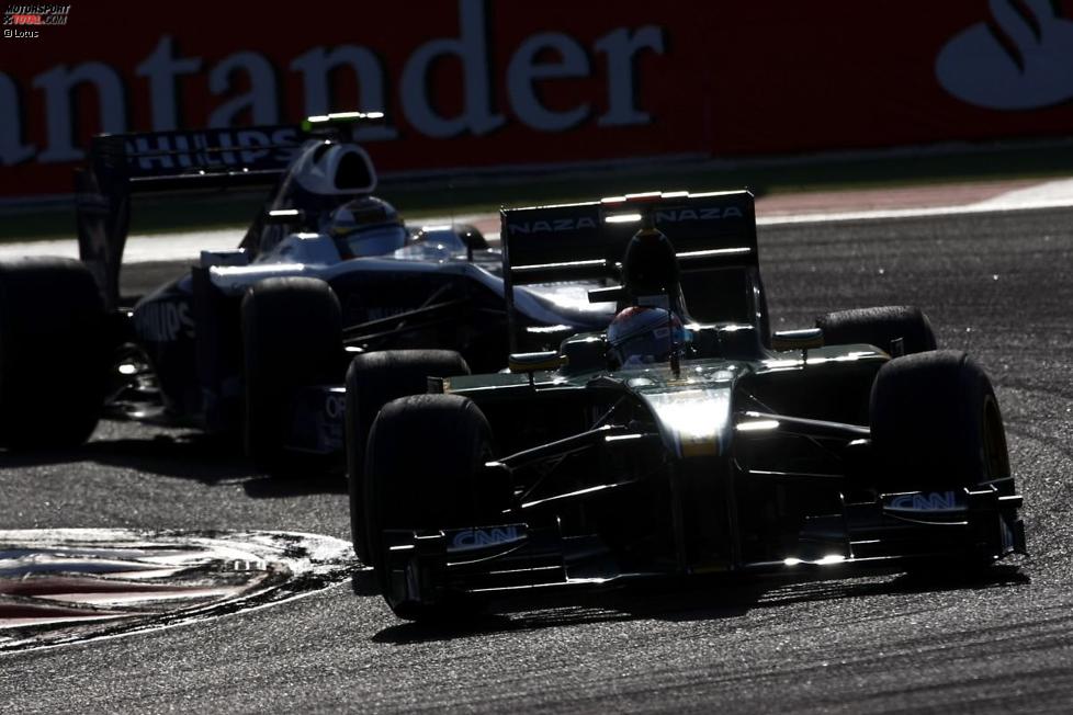 Jarno Trulli (Lotus) vor Nico Hülkenberg (Williams)