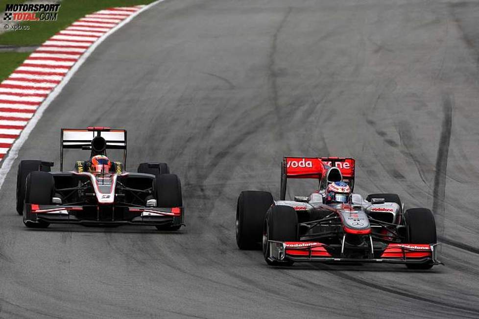 Jenson Button (McLaren) und Karun Chandhok (HRT) 