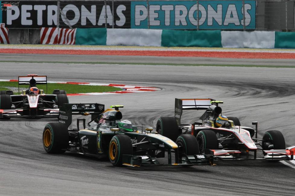 Heikki Kovalainen (Lotus) und Bruno Senna (HRT) 