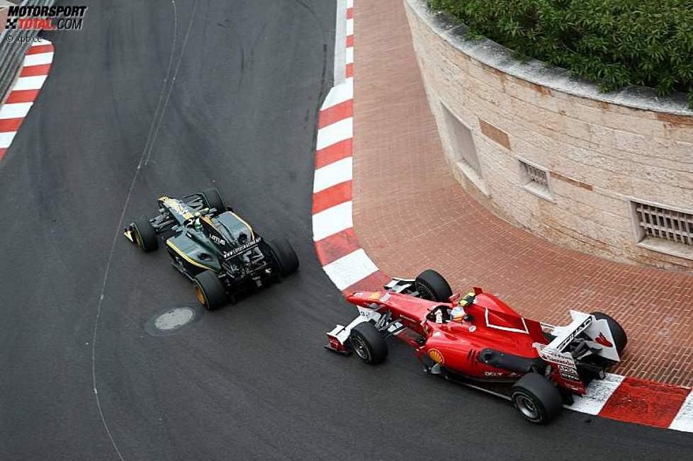 Heikki Kovalainen (Lotus) vor Fernando Alonso (Ferrari) 