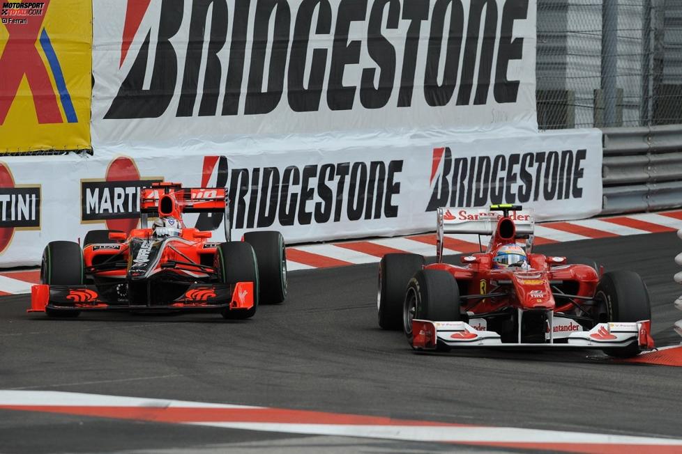 Fernando Alonso (Ferrari) und Timo Glock (Virgin)