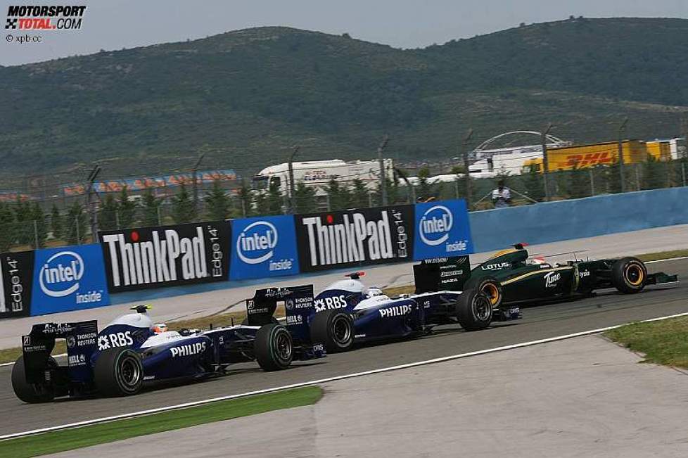 Jarno Trulli (Lotus) wird verfolgt von Rubens Barrichello (Williams) und Nico Hülkenberg (Williams) 