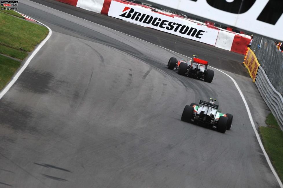 Lewis Hamilton (McLaren) vor Vitantonio Liuzzi (Force India) 