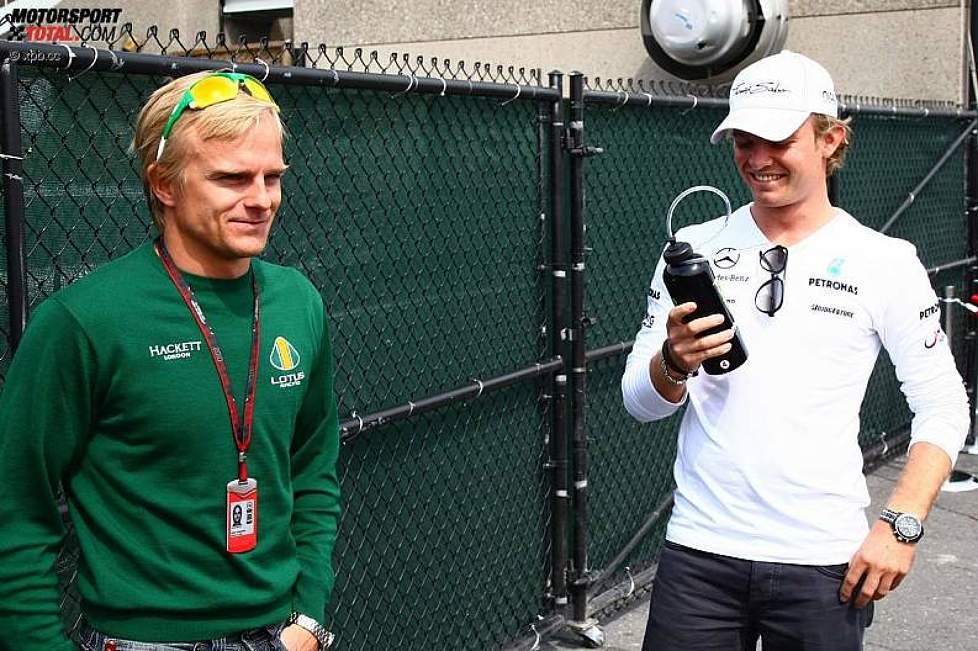 Heikki Kovalainen (Lotus) und Nico Rosberg (Mercedes) 