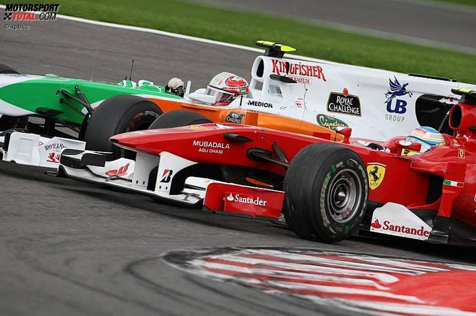 Fernando Alonso (Ferrari) und Vitantonio Liuzzi (Force India) 