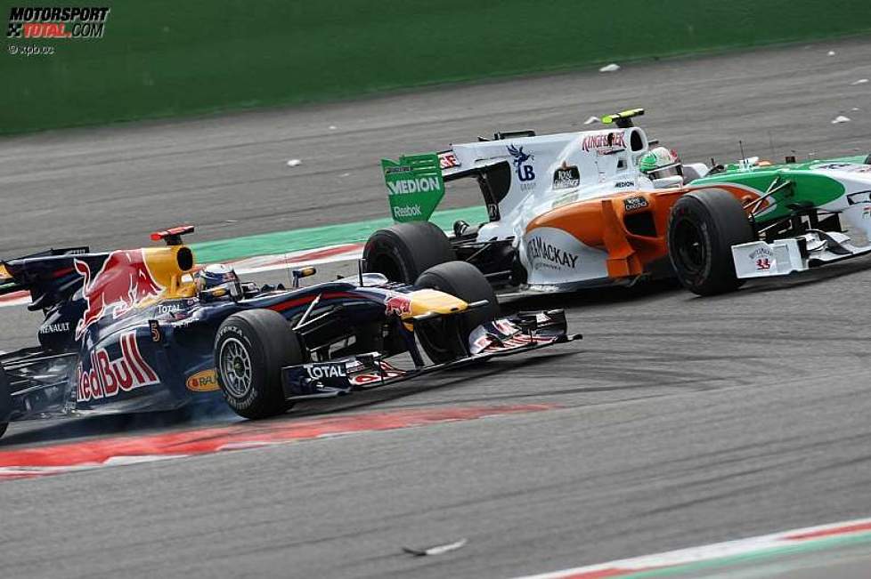 Sebastian Vettel (Red Bull) und Vitantonio Liuzzi (Force India) 