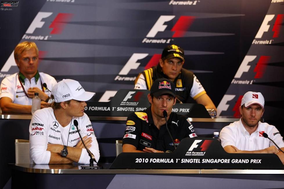 Pressekonferenz in Singapur, oben: Heikki Kovalainen (Lotus) und Vitaly Petrov (Renault); unten: Nico Rosberg (Mercedes), Mark Webber (Red Bull) und Nick Heidfeld (Sauber) 