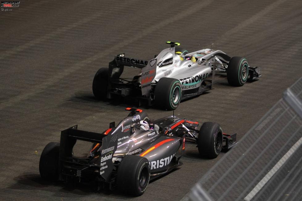 Nico Rosberg (Mercedes) und Christian Klien (HRT) 