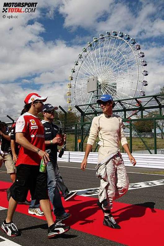 Felipe Massa (Ferrari), Rubens Barrichello (Williams) und Bruno Senna (HRT) 