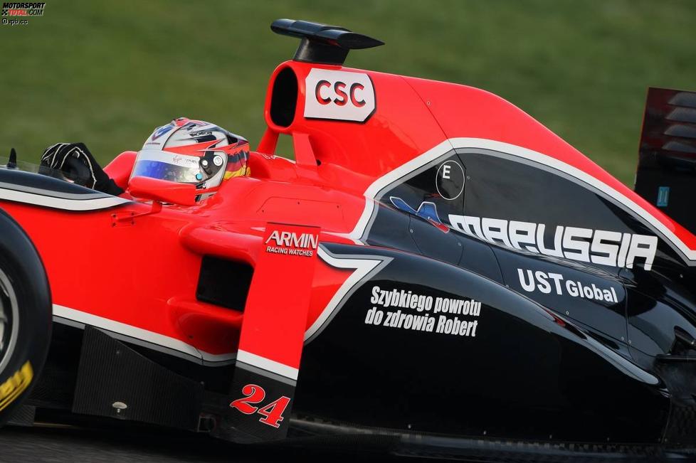 Timo Glock (Marussia-Virgin) mit einer Grußbotschaft an Robert Kubica (Renault) auf dem Auto