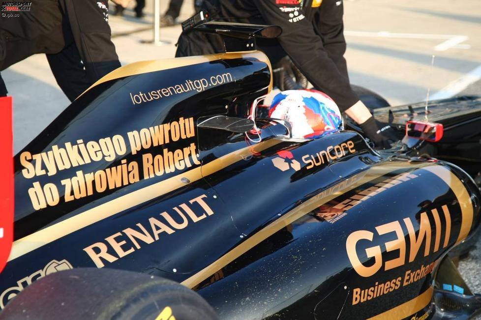 Witali Petrow (Renault) mit einer Genesungsbotschaft an Robert Kubica (Renault) 