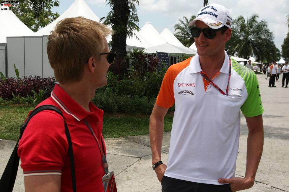 Heikki Kovalainen (Lotus) und Adrian Sutil (Force India) 