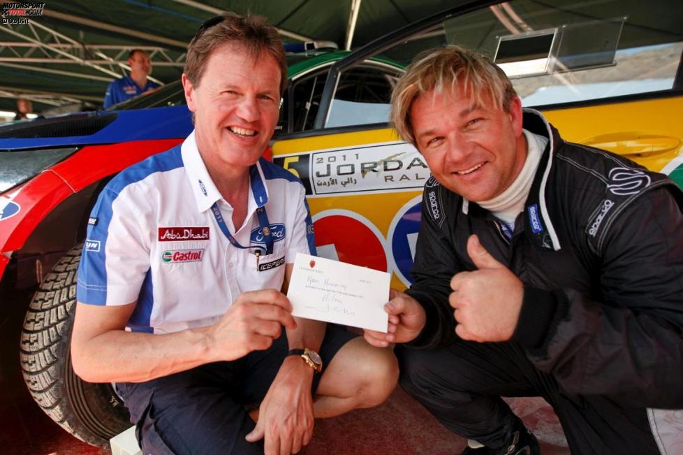 Henning Solberg und Malcolm Wilson (Ford-Teamchef) 