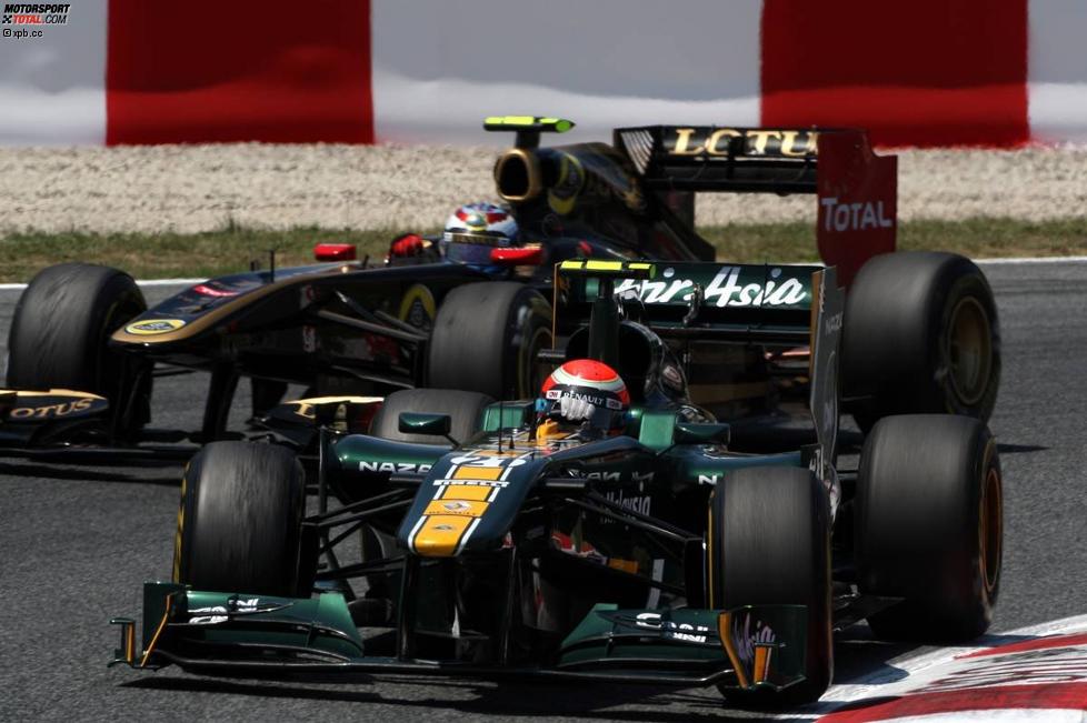 Jarno Trulli (Lotus) vor Witali Petrow (Renault) 