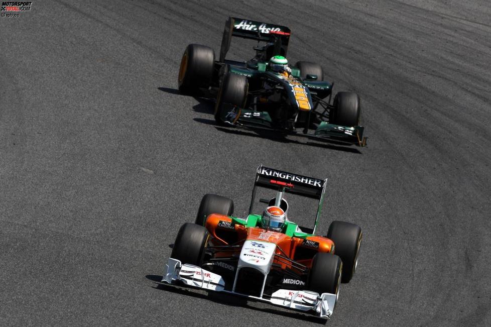 Adrian Sutil (Force India) vor Heikki Kovalainen (Lotus) 