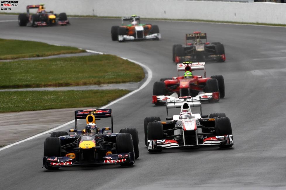 Sebastian Vettel (Red Bull) Kamui Kobayashi (Sauber) 